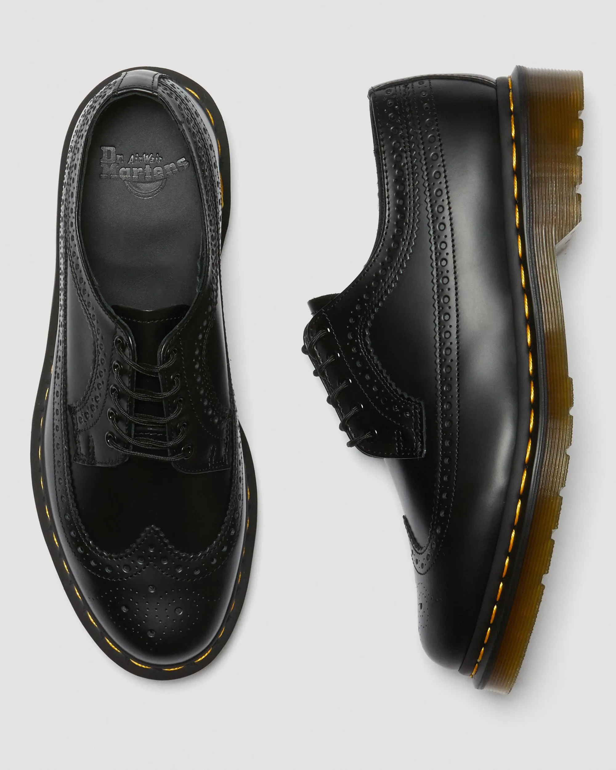 3989 Yellow brogue shoes made of smooth leather with Dr stitching. Martens